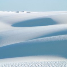 Rolling white dunes to the horizon